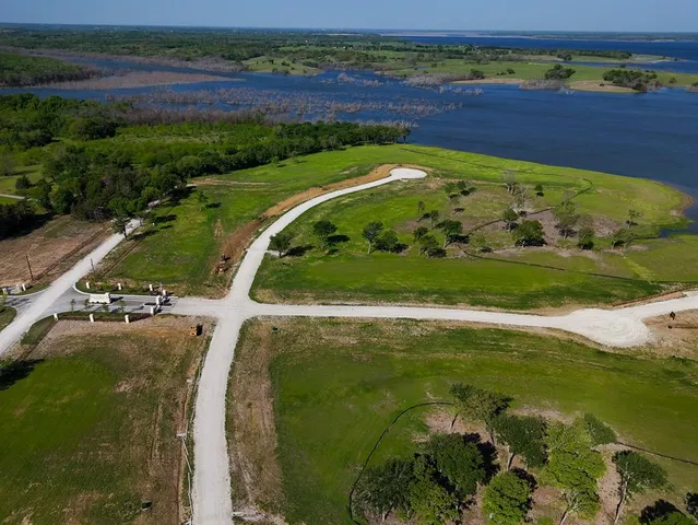 a view of a golf course with a yard