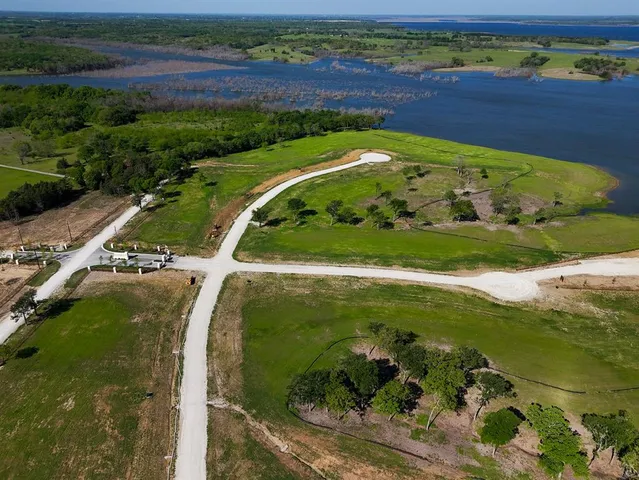 an aerial view of a golf course with a yard