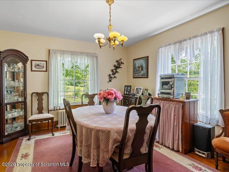 71 Pleasant Avenue Thompson, PA 18465 - Photo 9 of 37 a view of a dining room with furniture window and outside view