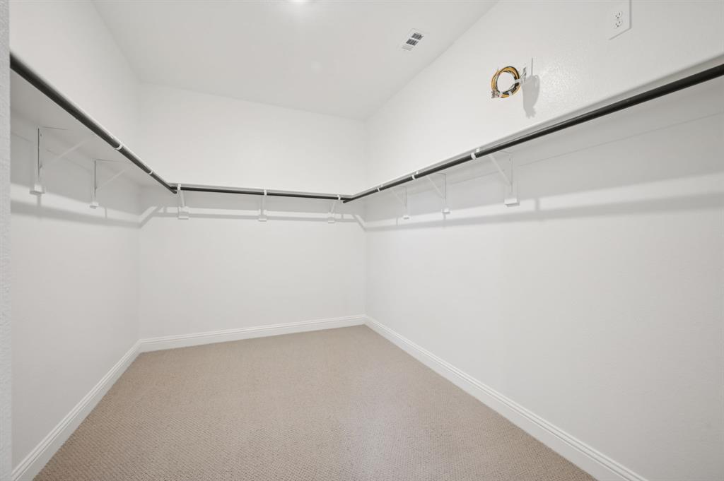 2713 Grand Cyn Street Anna, TX 75409 - Photo 30 of 32 Photo is not of the actual home, but is an inspirational photo of builder’s model home and may depict options, furnishings, and/or decorator features that are not included.