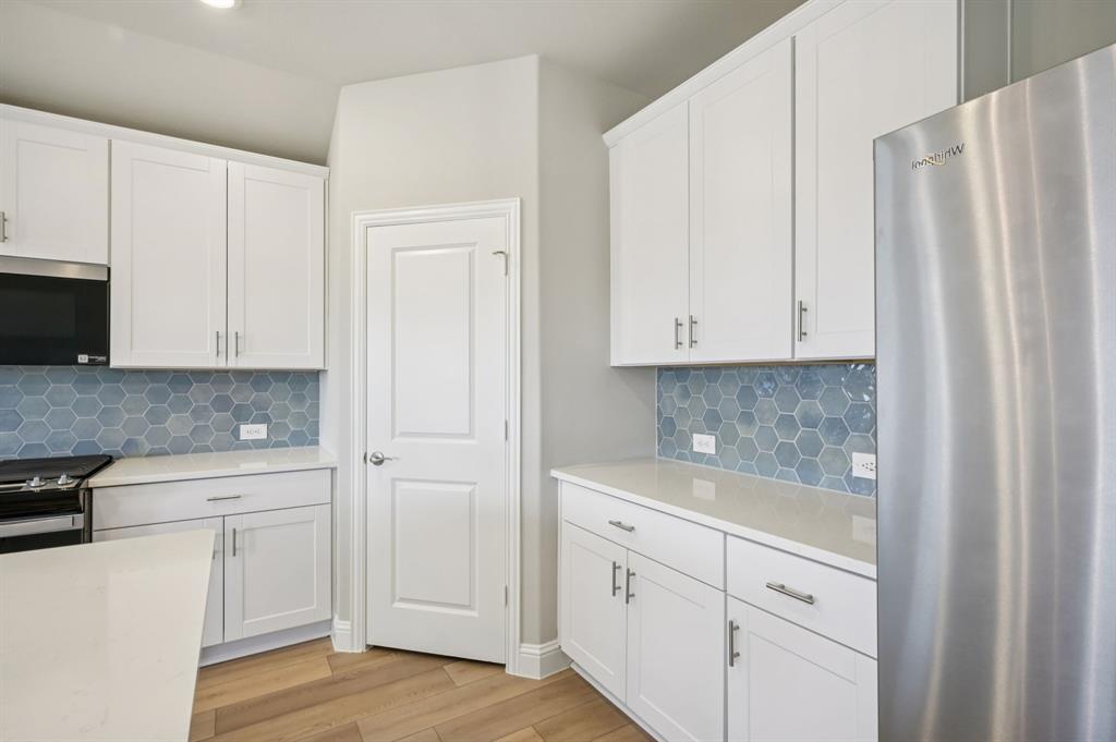 2713 Grand Cyn Street Anna, TX 75409 - Photo 9 of 32 Photo is not of the actual home, but is an inspirational photo of builder’s model home and may depict options, furnishings, and/or decorator features that are not included.