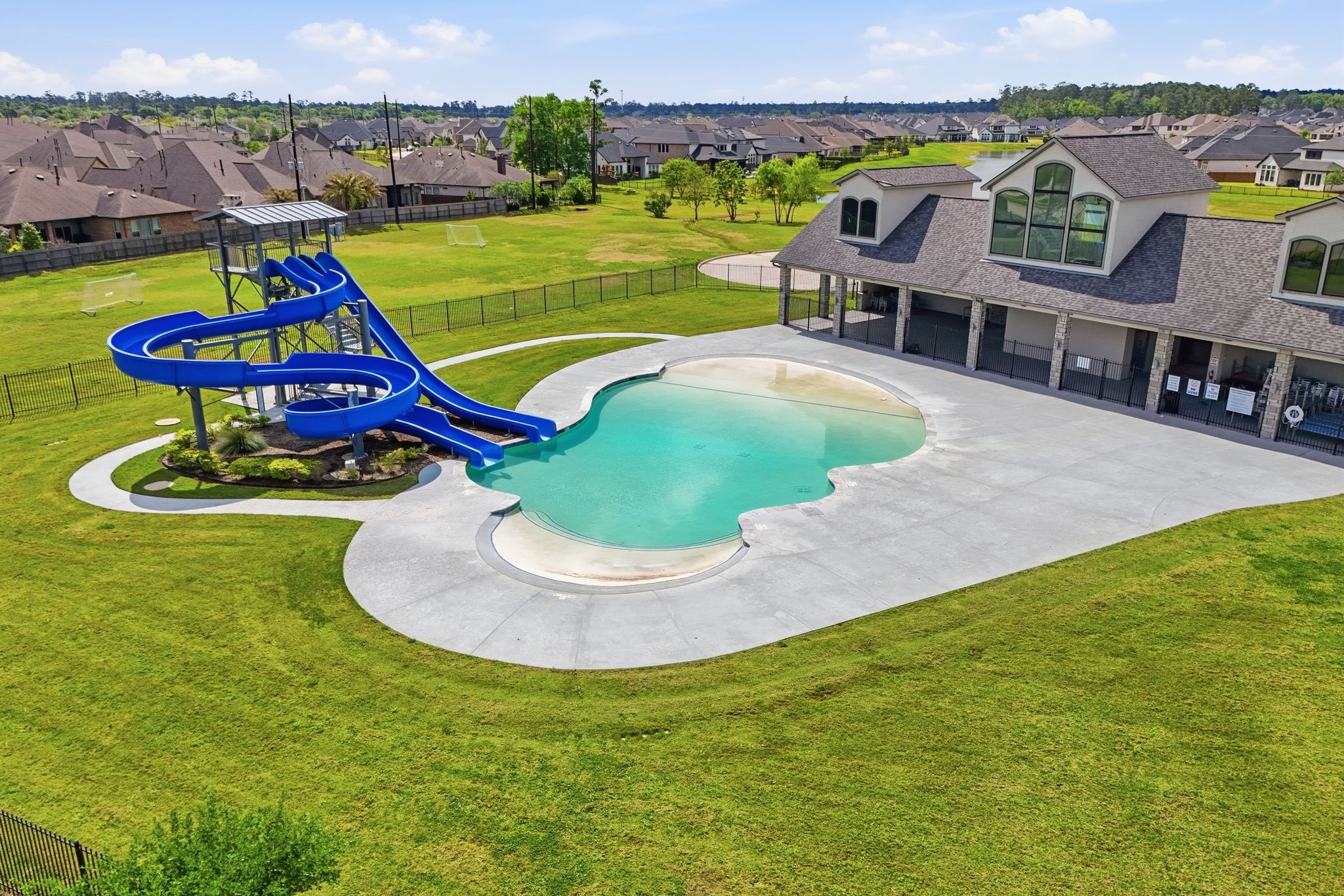 24423 Morningside Terrace Tomball, TX 77375 - Photo 34 of 47 an aerial view of a house with a big yard and large trees