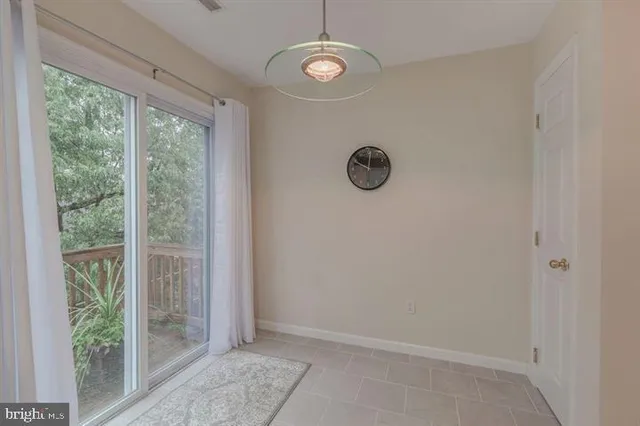 a view of a livingroom with a large window