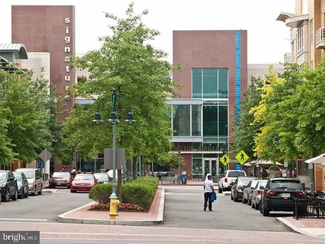 a front view of a building with street view