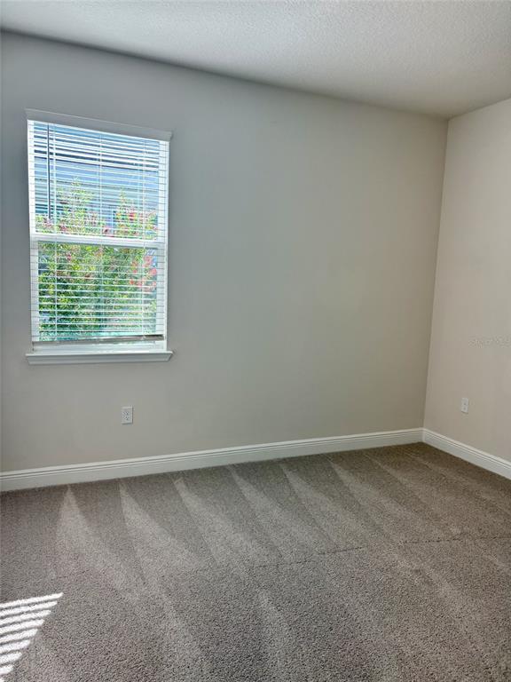 4307 Pullet Court Lakewood Ranch, FL 34211 - Photo 15 of 16 an empty room with a window