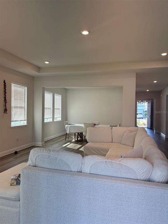 4307 Pullet Court Lakewood Ranch, FL 34211 - Photo 6 of 16 a living room with furniture and a window