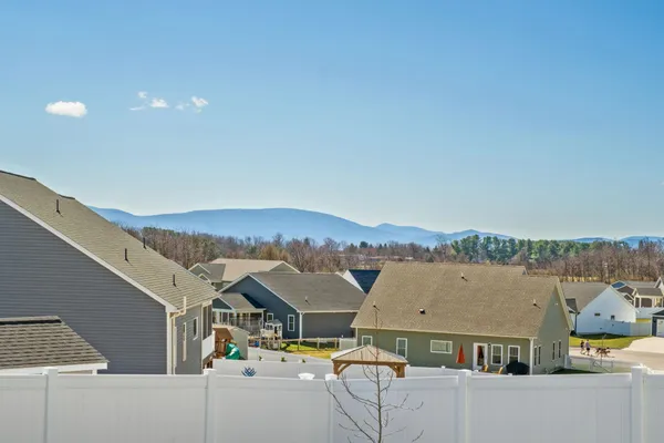 a view of house with a mountain view