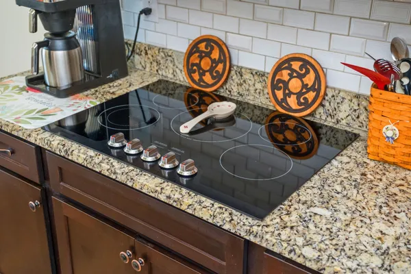a bathroom with a sink and a stove