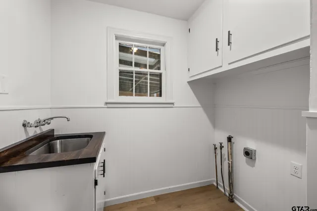 a bathroom with a sink and vanity