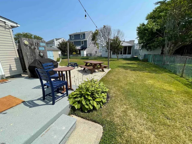 a view of a swimming pool and sitting area