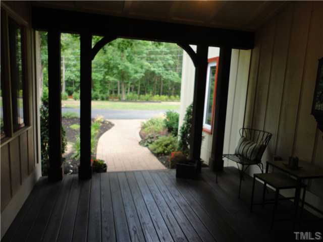 10232 Baileywick Road Raleigh, NC 27613 - Photo 20 of 24 a view of balcony and yard with wooden floor