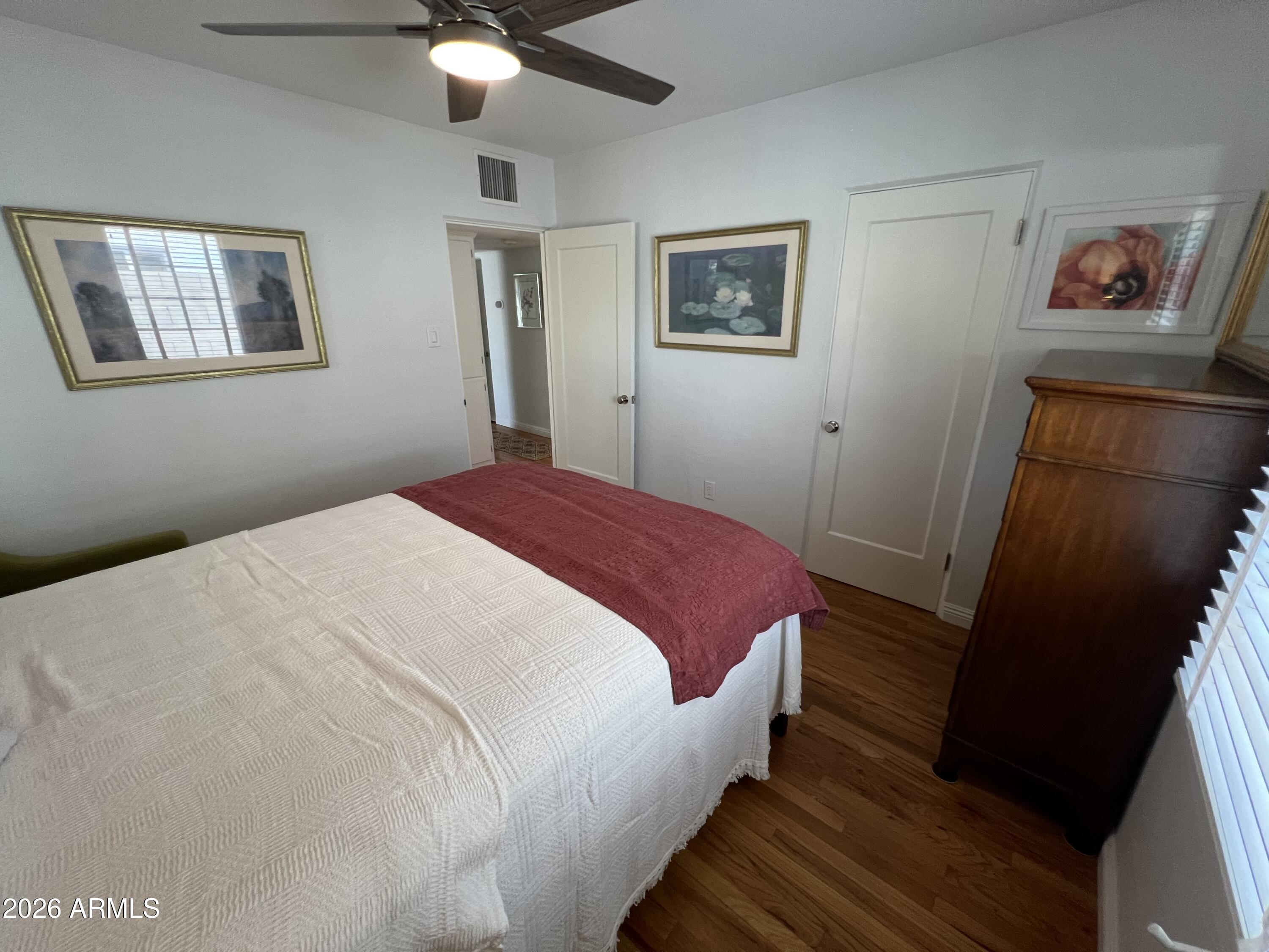 1326 East Coronado Road Phoenix, AZ 85006 - Photo 18 of 36 a bedroom with a bed and a mirror