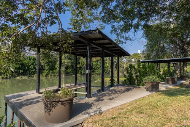 a spacious bathroom with a large tub and view