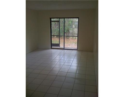 11200 West Sample Road, Unit 1A Coral Springs, FL 33065 - Photo 2 of 9 Living Room