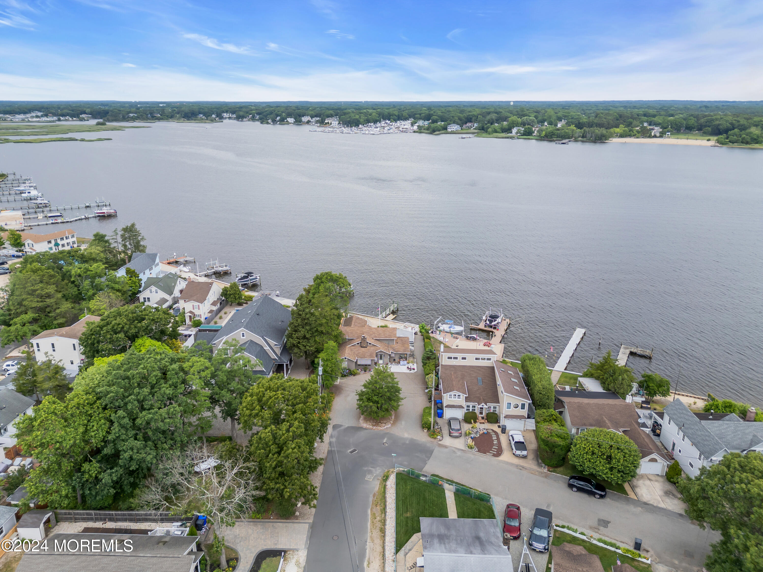 15 Edwards Road Brick, NJ 08723 - Photo 38 of 42 an aerial view of a city with lots of residential buildings lake and ocean view