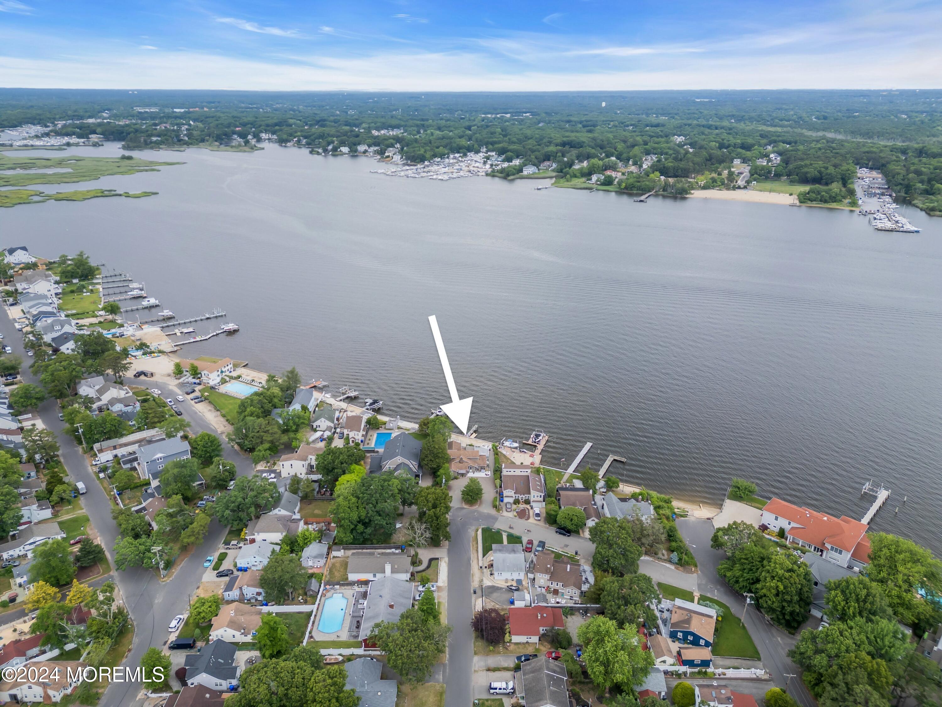 15 Edwards Road Brick, NJ 08723 - Photo 40 of 42 a view of a lake with a city view