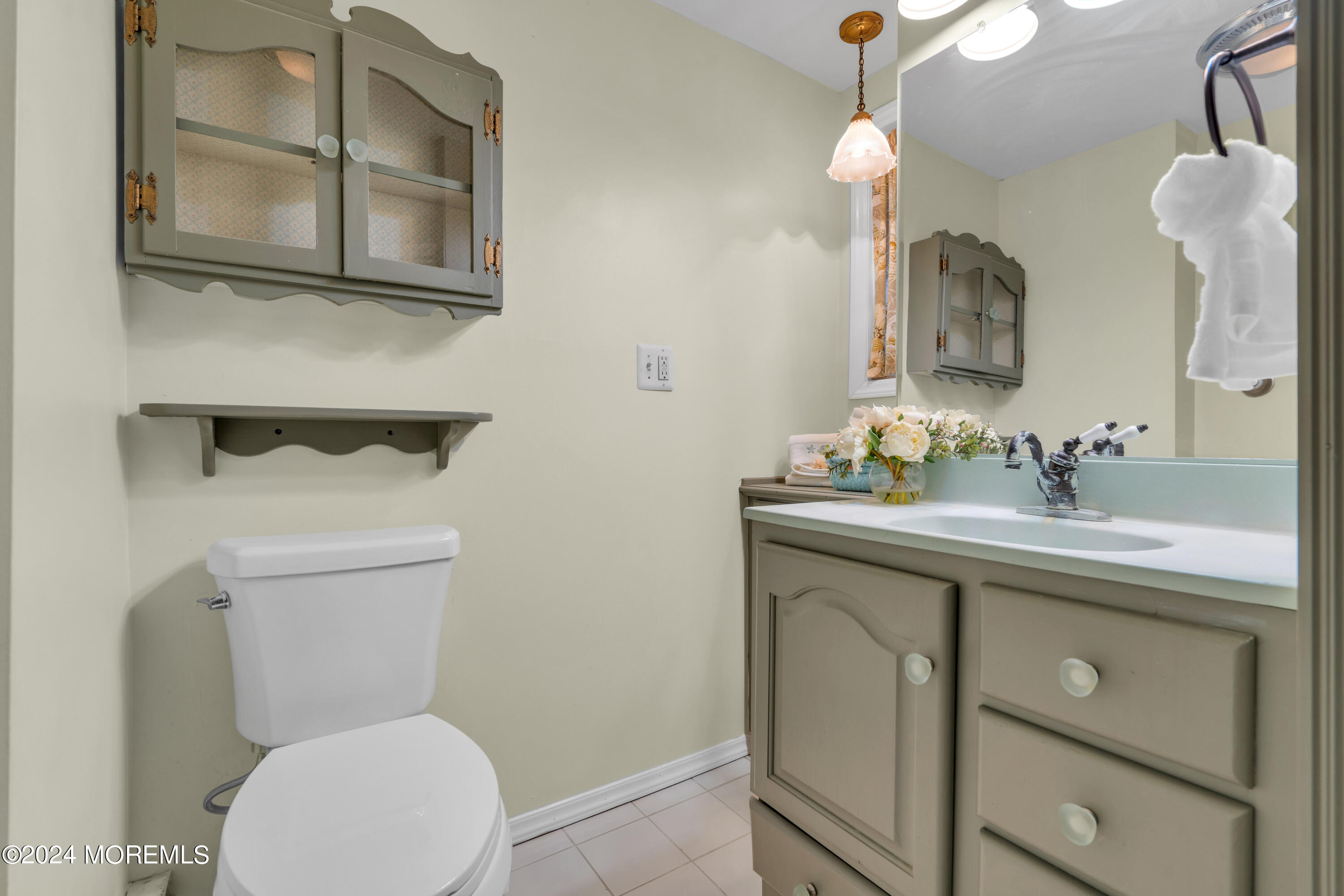 15 Edwards Road Brick, NJ 08723 - Photo 9 of 42 a bathroom with a toilet a sink and mirror