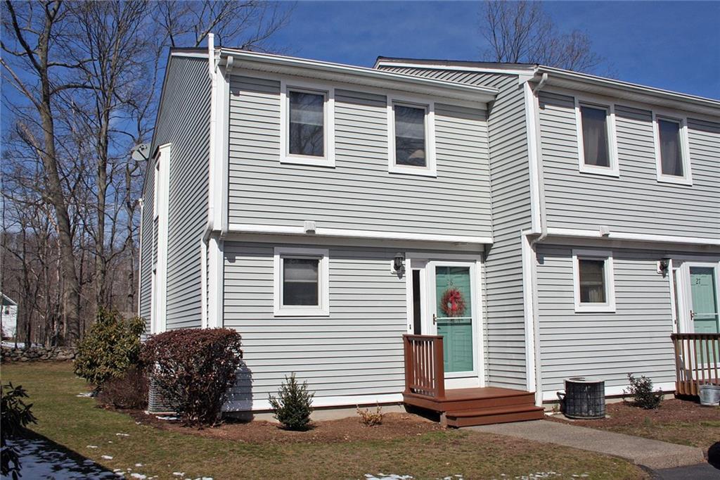 28 Mallard Cove Road, Unit 28 East Hampton, CT 06424 - Photo 1 of 1 a view of a house with a yard