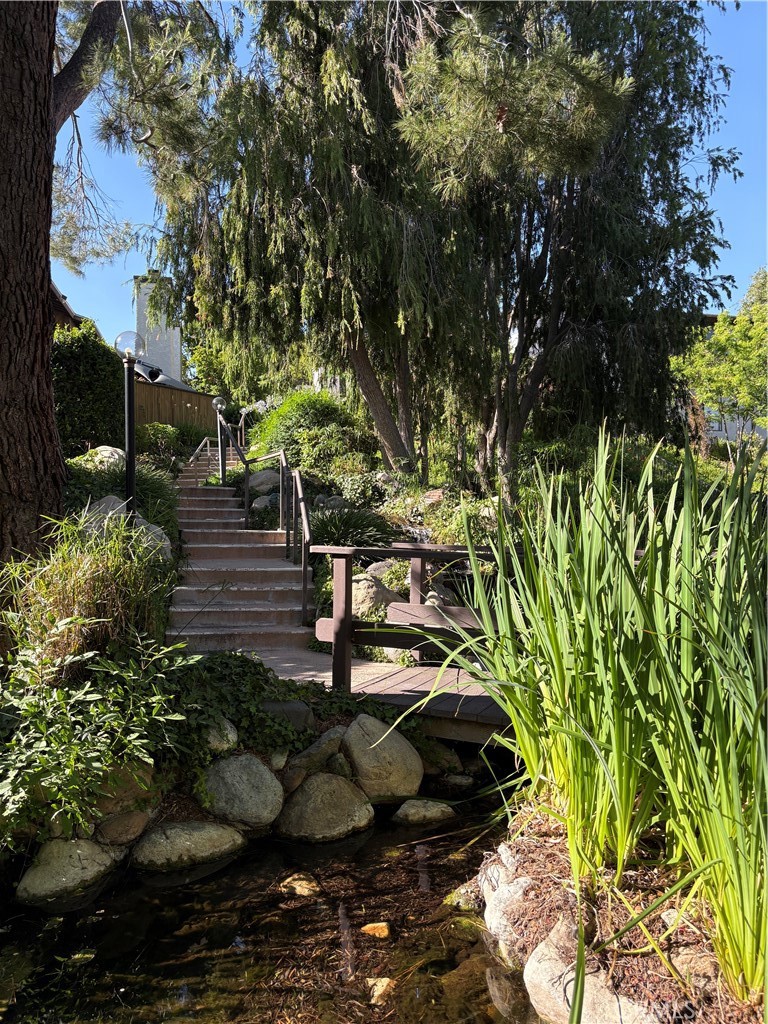 18223 Soledad Canyon Road, Unit 29 Canyon Country, CA 91387 - Photo 21 of 23 a backyard of a house with lots of green space