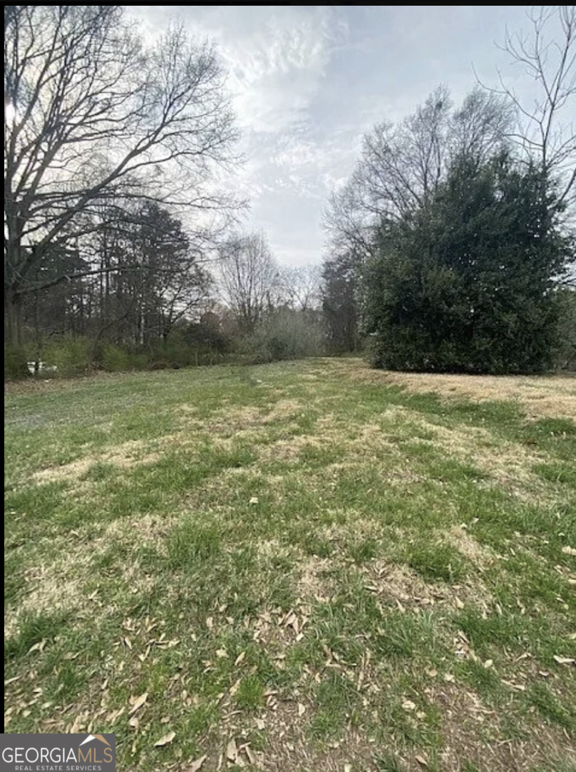a view of outdoor space and yard