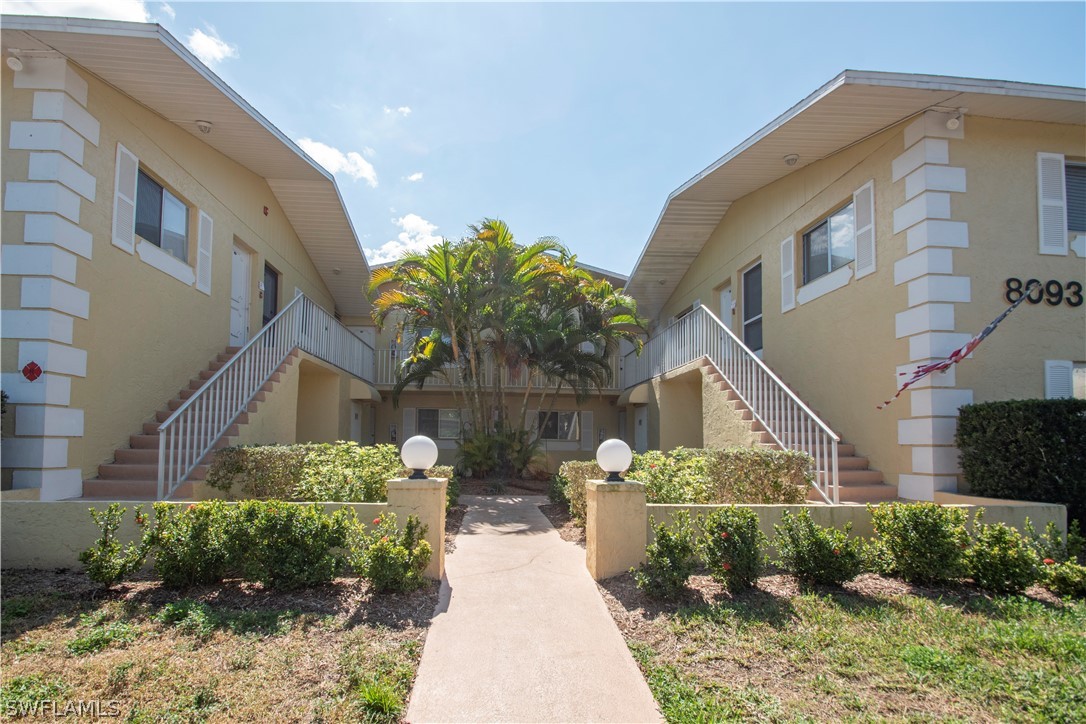 8093 Country Road, Unit 105 Fort Myers, FL 33919 - Photo 1 of 22 a front view of a house