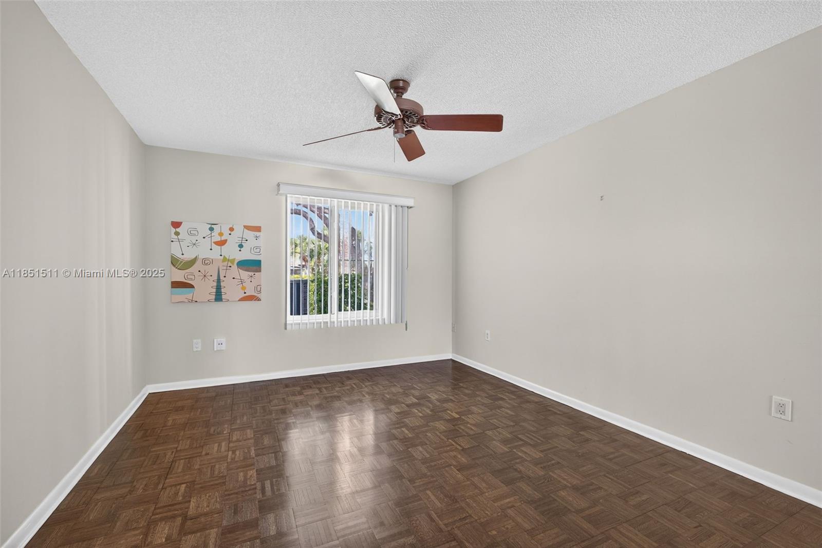 257 Ridge Road Jupiter, FL 33477 - Photo 36 of 84 an empty room with windows and fan