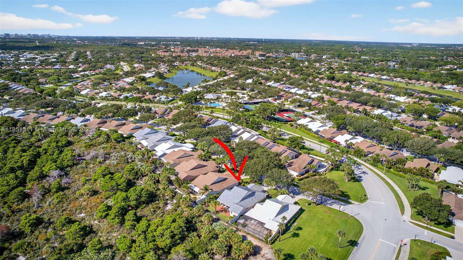 257 Ridge Road Jupiter, FL 33477 - Photo 68 of 84 an aerial view of residential houses with outdoor space and trees