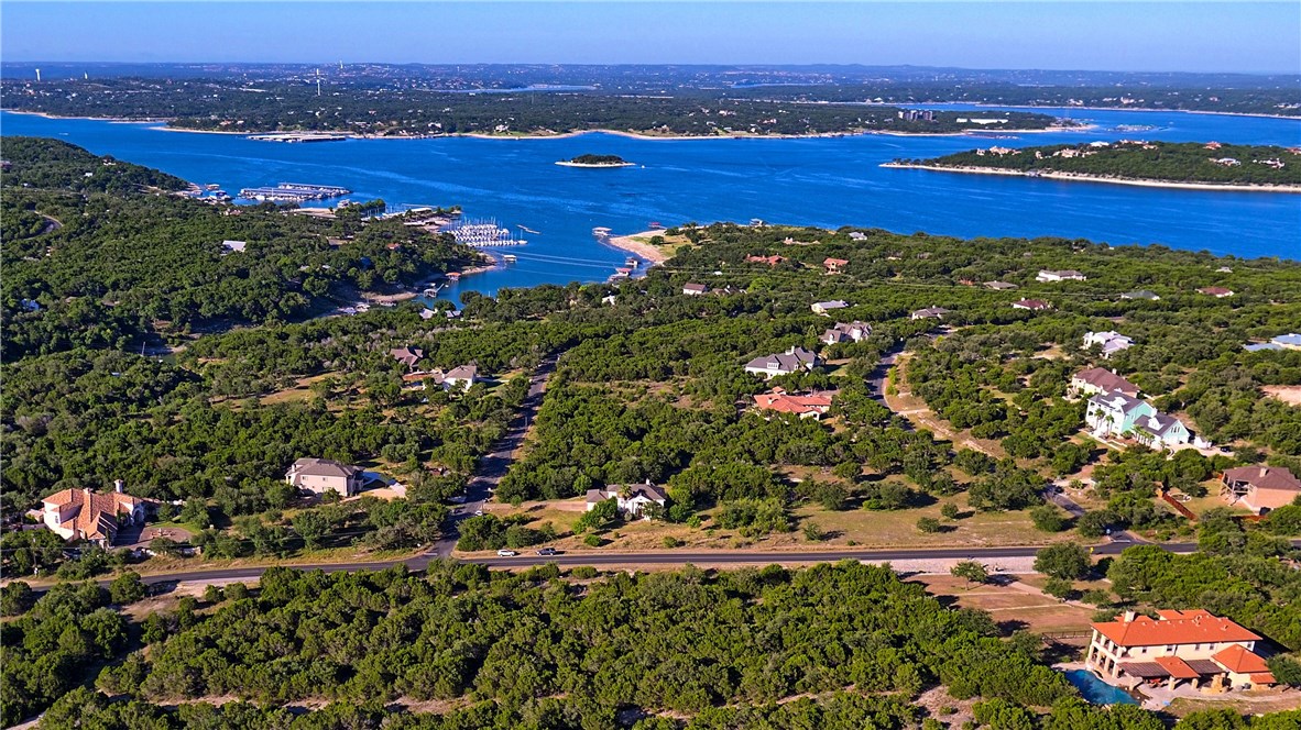 8267 Lime Creek Road Volente, TX 78641 - Photo 5 of 13 a view of lake and mountain