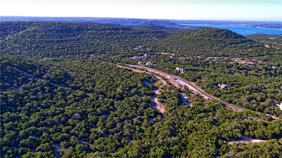 8267 Lime Creek Road Volente, TX 78641 - Photo 6 of 13 a view of city and mountain
