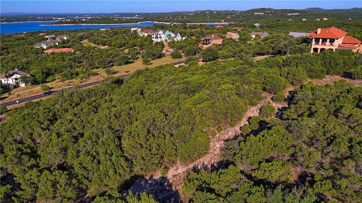 8267 Lime Creek Road Volente, TX 78641 - Photo 9 of 13 a view of city and mountain