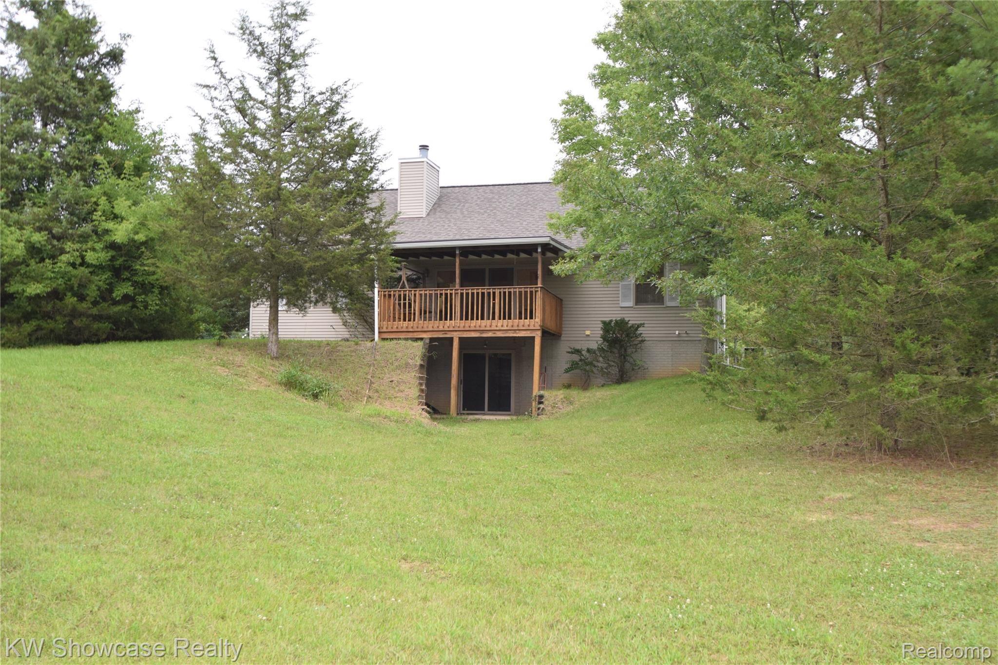 6720 Cedar Lake Road Pinckney, MI 48169 - Photo 43 of 50 View of back of home