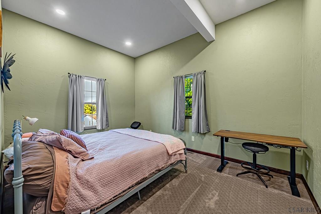 539 Lake Side Road Addison, PA 15411 - Photo 30 of 42 a bedroom with a bed and a desk