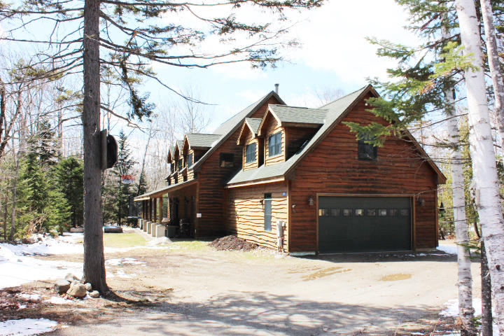 2001 Pine Road Carrabassett Valley, ME 04947 - Photo 2 of 27 Two car garage