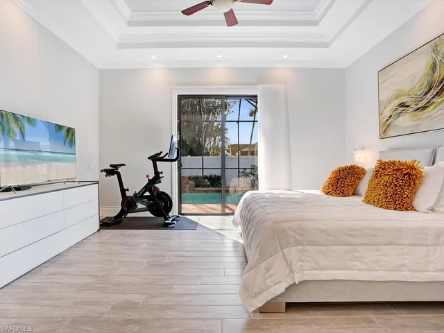 a bedroom with a bed and a cabinets