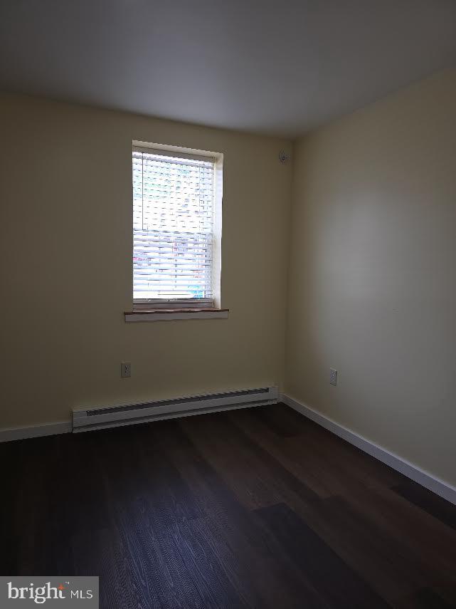 56 Valley Street Lewistown, PA 17044 - Photo 6 of 6 an empty room with wooden floor and windows
