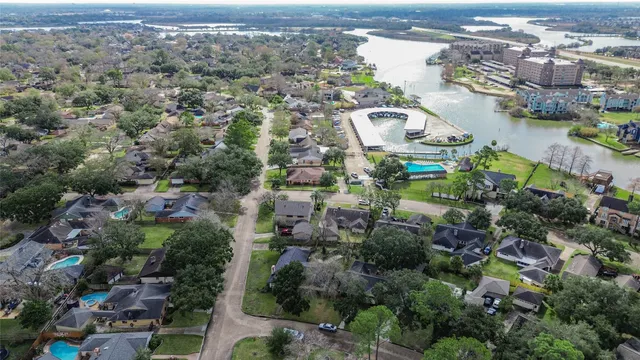 an aerial view of a city with lots of residential buildings