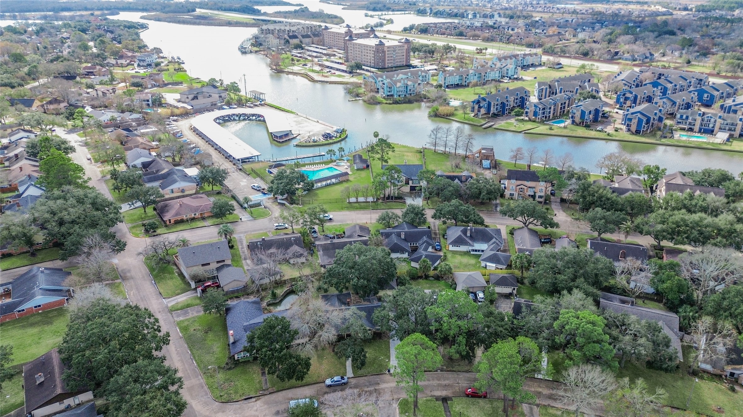 18230 Caprice Lane Houston, TX 77058 - Photo 19 of 34 an aerial view of lake and residential houses with outdoor space