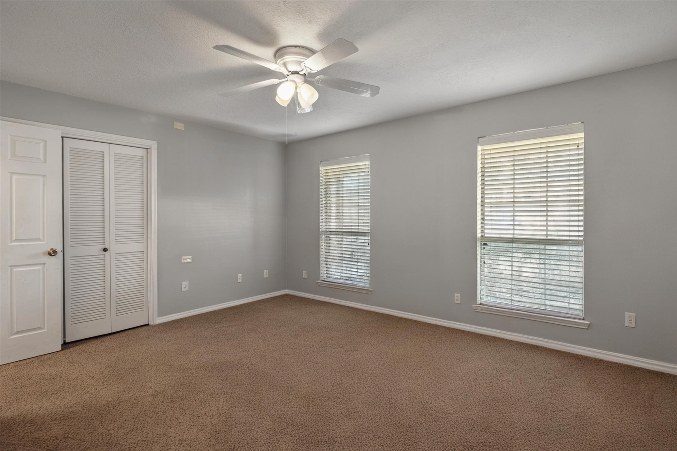 18230 Caprice Lane Houston, TX 77058 - Photo 8 of 34 a view of an empty room with a window