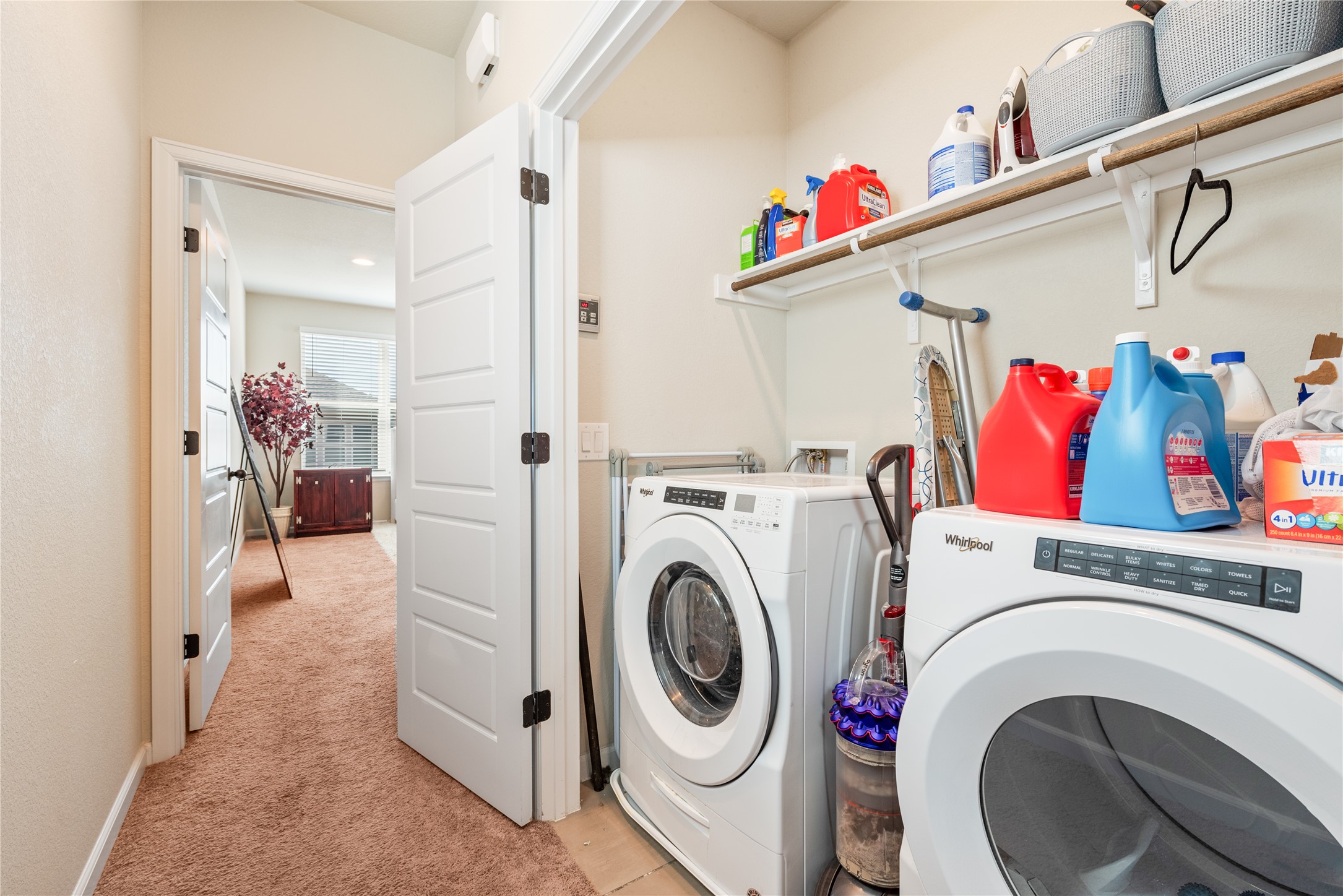 13602 Terrett Trace, Unit 102 Austin, TX 78717 - Photo 13 of 23 a utility room with dryer and washer