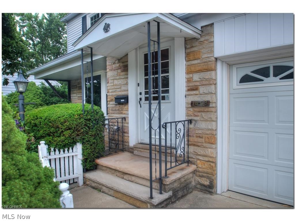1443 Clearview Road Cleveland, OH 44124 - Photo 2 of 19 Covered entryway offers a warm welcome to guests. Note the newer garage door.
