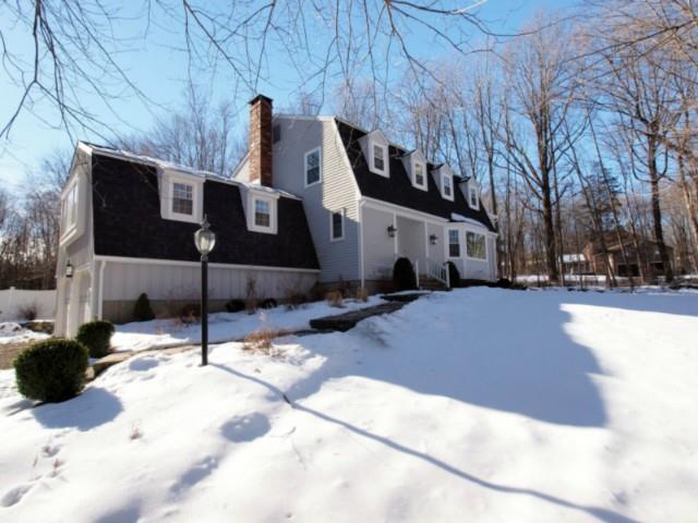 6 Monitor Hill Road Newtown, CT 06470 - Photo 1 of 1 a view of a building with snow