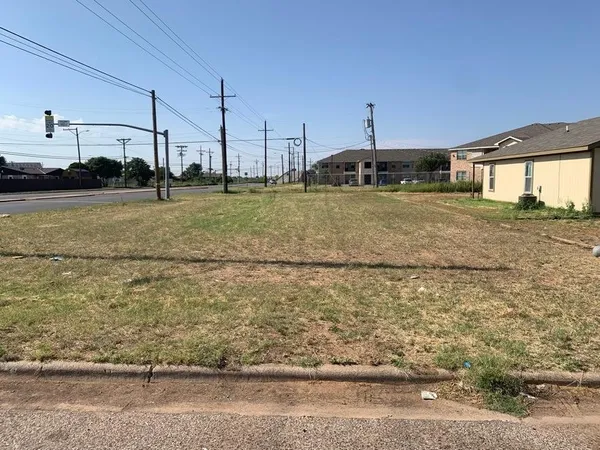 a view of street with yard