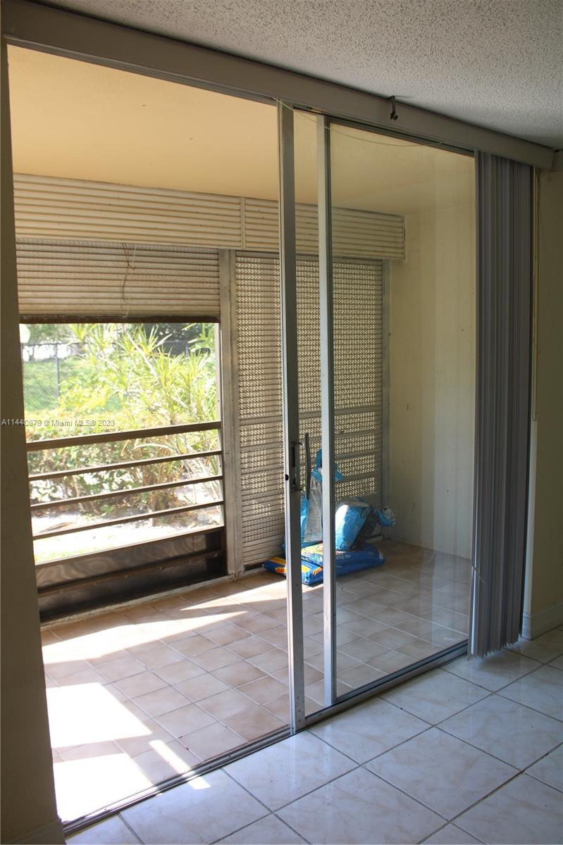 3490 Foxcroft Road, Unit B110 Miramar, FL 33025 - Photo 19 of 39 a view of a room with a large window