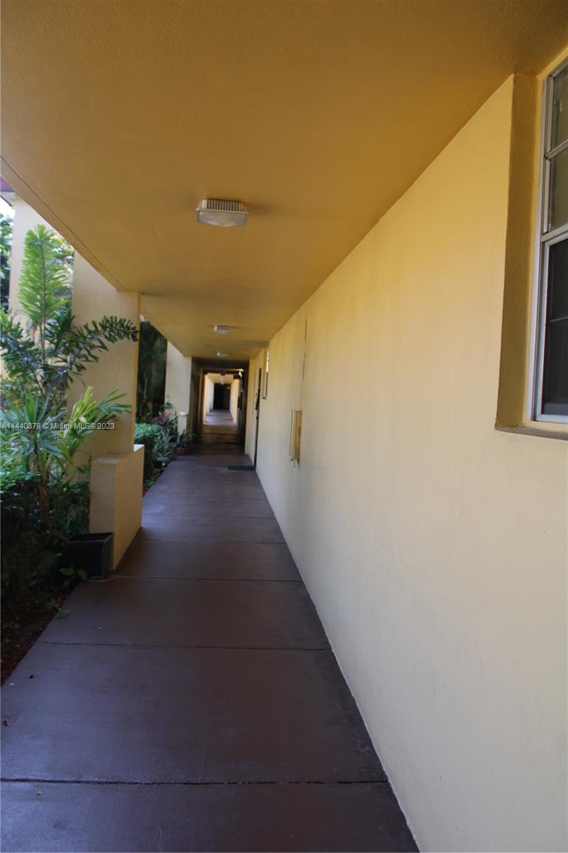 3490 Foxcroft Road, Unit B110 Miramar, FL 33025 - Photo 21 of 39 a view of a back yard from a balcony