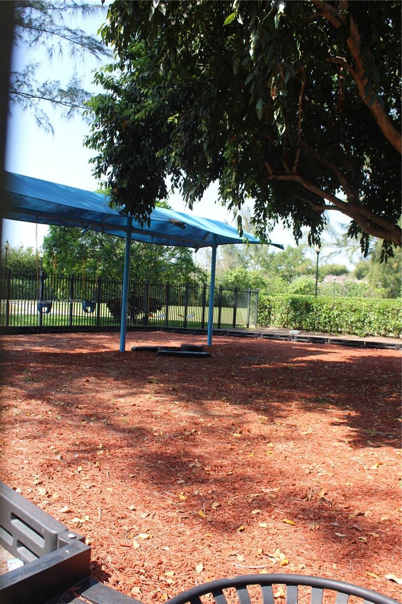 3490 Foxcroft Road, Unit B110 Miramar, FL 33025 - Photo 27 of 39 a view of a yard