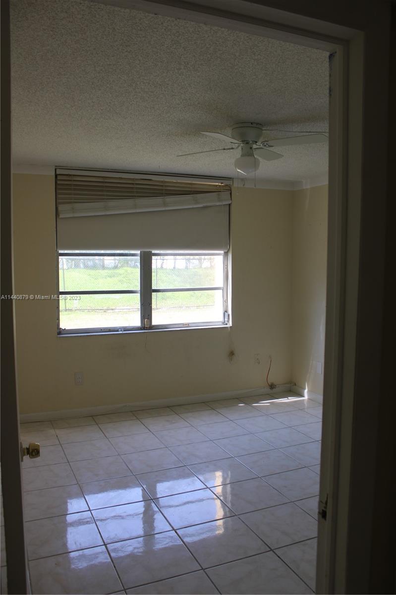 3490 Foxcroft Road, Unit B110 Miramar, FL 33025 - Photo 3 of 39 a view of room and window