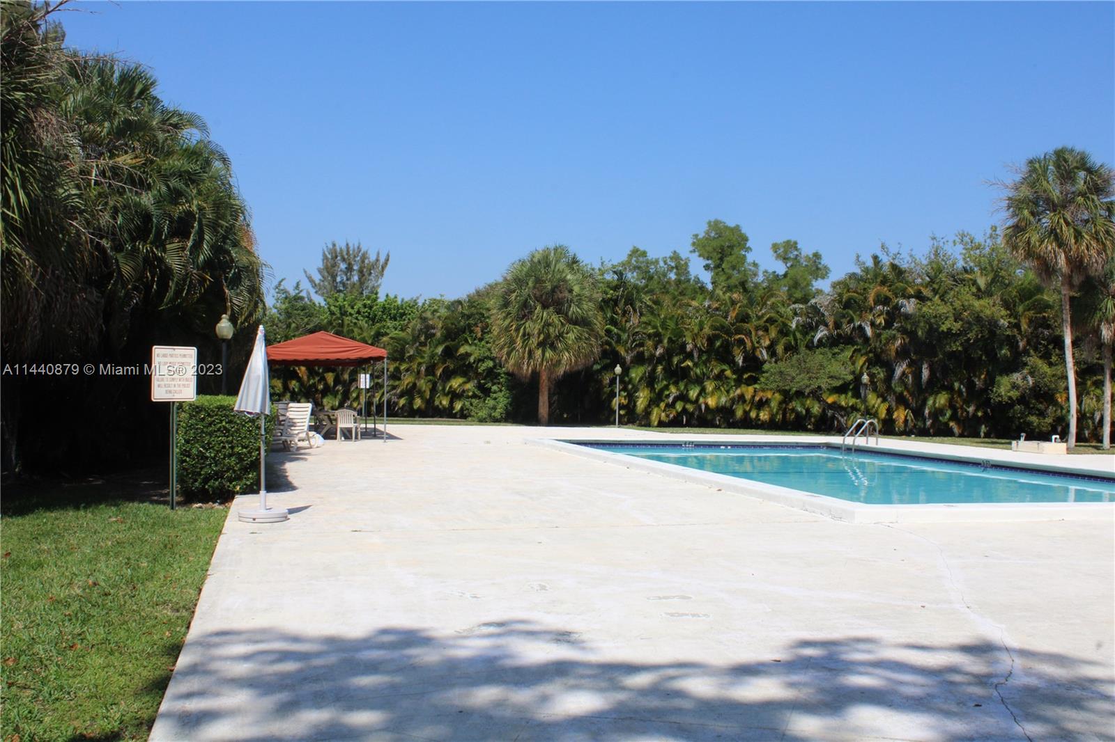 3490 Foxcroft Road, Unit B110 Miramar, FL 33025 - Photo 33 of 39 a view of outdoor space yard and patio