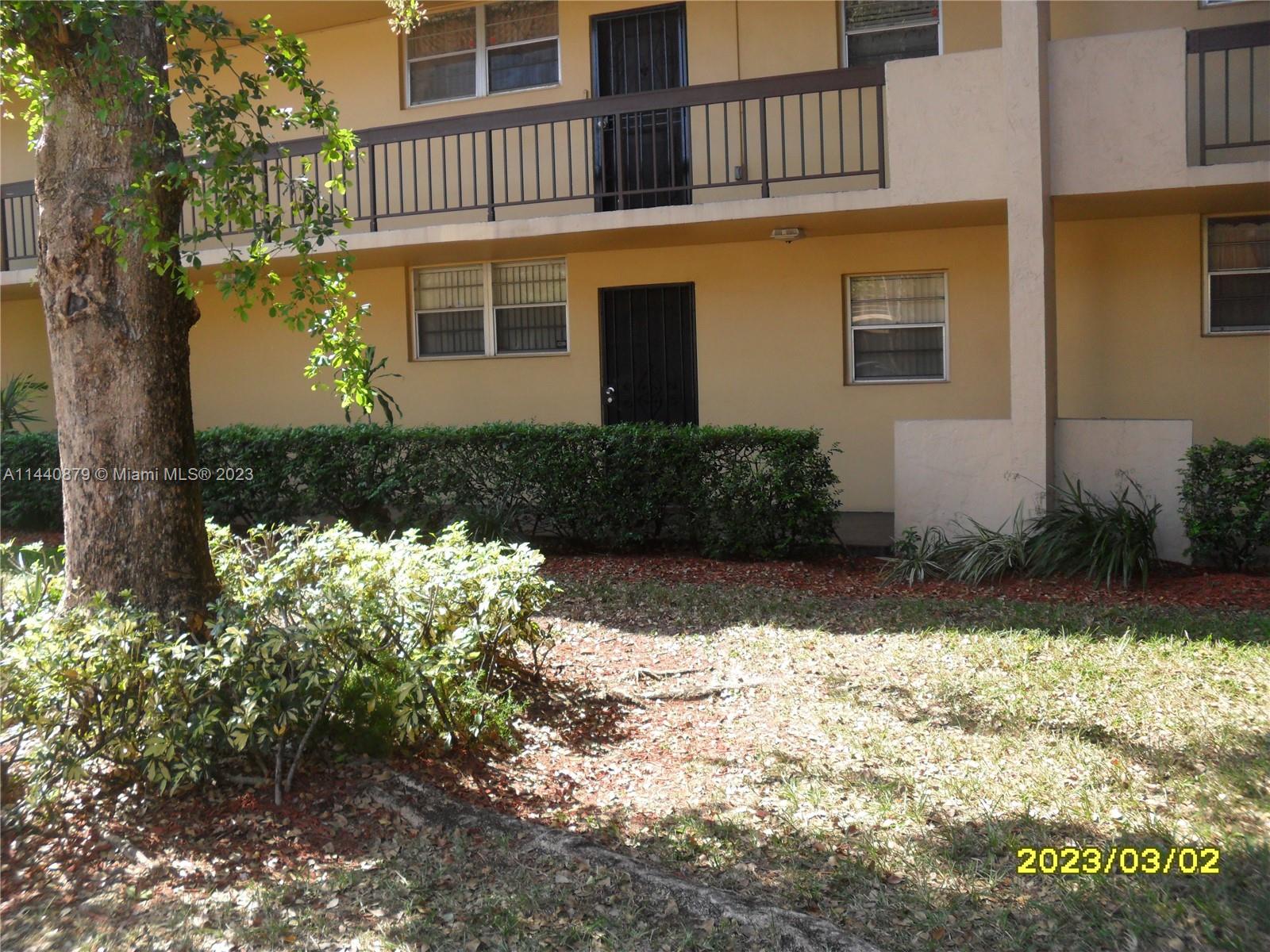 3490 Foxcroft Road, Unit B110 Miramar, FL 33025 - Photo 39 of 39 a view of a house with a yard