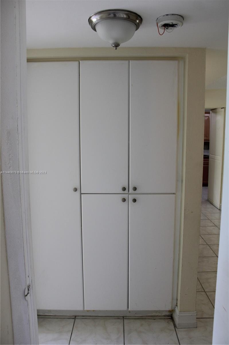 3490 Foxcroft Road, Unit B110 Miramar, FL 33025 - Photo 7 of 39 a view of a hallway