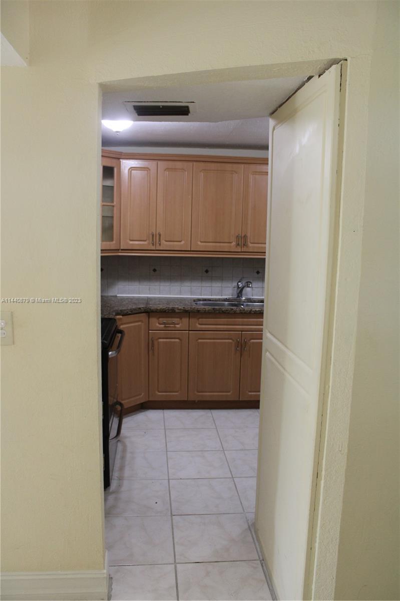 3490 Foxcroft Road, Unit B110 Miramar, FL 33025 - Photo 8 of 39 a utility room with a sink